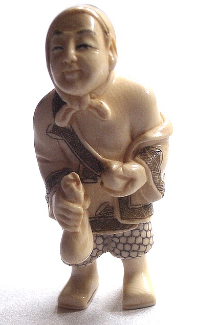 японская нэцкэ из кости Игрок, 1950-е гг.
