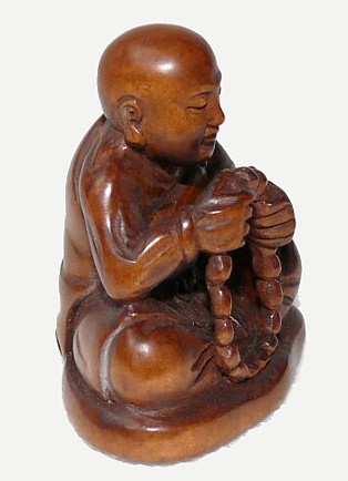 буддийский монах с четками, нэцкэ